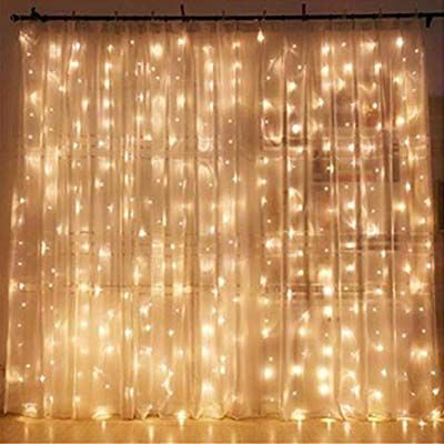 4. Twinkle Star 300 LED Window Curtain String Lights